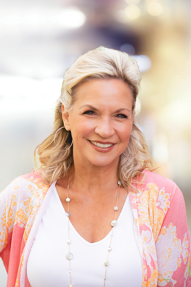 Portrait of Debra Noone, REALTOR®.